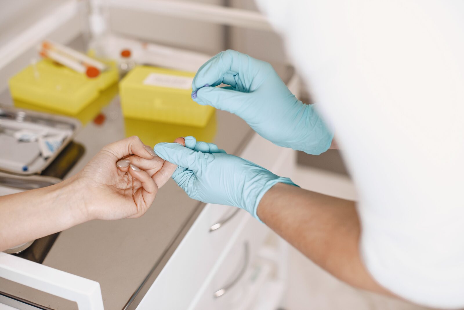 A healthcare worker drawing a blood sample